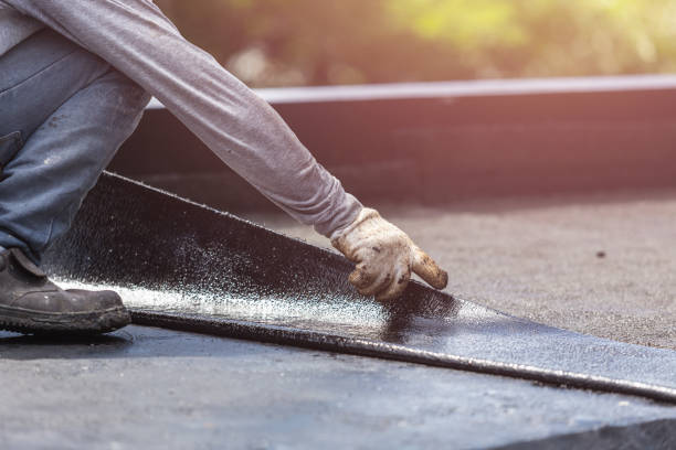 Professional Basement Waterproofing technician working in Fair Haven, NY